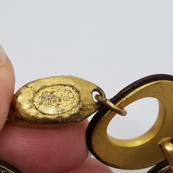 Chico's gold tone cutout disk bracelet with brown trim - Picture 2 of 5